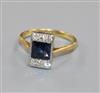 An 18ct gold and platinum, synthetic sapphire and diamond tablet ring, size P/Q.                                                       