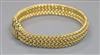 An Italian 18ct gold woven link bracelet, 19.5cm.                                                                                      