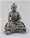 A Chinese bronze seated figure of Buddha Shakyamuni, 18th/19th century, total height 18.5cm                                            