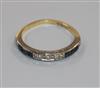 An 18ct gold, diamond and sapphire half eternity ring, size P/Q.                                                                       