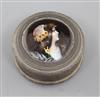 A late 19th/early 20th century French silver and Limoges enamel circular snuff box and cover, 57mm.                                    