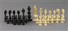 A mid 19th century Anglo Indian turned black stained and natural ivory chess set, kings 3.5in.                                         