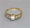 An 18ct gold, single stone cultured pearl and four stone diamond ring, size P/Q.                                                       