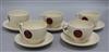 Five Moorcroft Poppy pattern cups and saucers                                                                                          