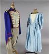 L'Elisir d'Amore: A rail of Royal blue tail coats with red and gold trim, a quantity of peasant blouses and skirts,                    