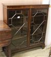 A small mahogany bookcase                                                                                                              