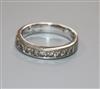 A modern Chisolm Hunter platinum and ten stone princess cut diamond half eternity ring, size O                                         