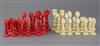 A mid 19th century Macao red stained and natural ivory figural chess set, kings 3.5in.                                                 