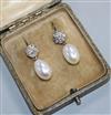 A pair of 18ct white gold, cultured pearl and diamond drop earrings, 23mm.                                                             