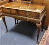 An early 18th century banded walnut side table, with later apron and legs W.100cm                                                      