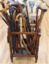 A Victorian mahogany stick stand containing a collection of walking sticks                                                             