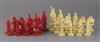 An early 19th century Chinese red stained and natural ivory 'rosette' type chess set, kings 3.25in.                                    