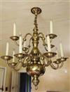 A late 19th century Dutch brass twelve light chandelier, length 39in.                                                                  