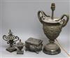 A metal two handled putti decorated table lamp, a metal box, a censer and a lamp                                                       