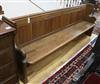 A church pew W.230cm                                                                                                                   