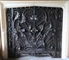 A black painted wrought iron and wire mesh chimneypiece spark guard, approx. W.4ft 6in.                                                