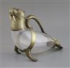 A Victorian novelty nickel mounted glass claret jug, modelled as a walrus, height 20.5cm.                                              