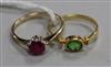 Two gem set rings, one 18ct and one 9ct gold and silver.                                                                               