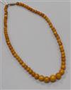 A single strand graduated amber bead necklace, gross 21 grams, 50cm                                                                    