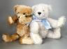 Four Deans teddy bears, a Steiff teddy and a Hermann teddy, Steiff bear, 39 cms high.                                                                                                                                       