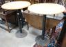 A pair of circular beech and iron pub tables, diameter 74cm, height 104cm                                                                                                                                                   