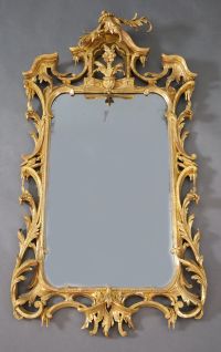 A George III Chippendale style carved giltwood wall mirror, W.1ft 10in. H.3ft 6in.                                                     