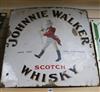 A Johnnie Walker Whisky enamelled advertising sign                                                                                     