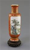 A Chinese coral ground famille rose cylindrical vase, Qianlong mark, Republic period, H. 15cm excluding wood stand                     