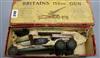 A boxed Britains 155mm model gun and a German tinplate small gauge loco tender and four carriages                                      