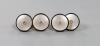 A cased pair of 18ct, mother of pearl, black enamel and diamond set circular cufflinks                                                                                                                                      