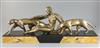 Michel Decoux (1837-1924). An Art Deco bronze group of a reclining woman with two panthers, 22.75in.                                   