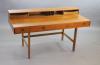 Jens Quistgaaard for Lovig, a Danish teak flip top desk circa 1973, W. 162. H. 86. D. 73 cm.                                                                                                                                