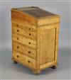 A Regency bird's eye maple Davenport, W.1ft 4in. D.1ft 10in. H.2ft 9in.                                                                