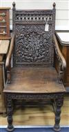 A pair of foliate carved armchairs                                                                                                     