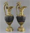 A pair of Renaissance style bronze and ormolu ewers, 20.5in.                                                                           