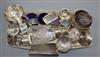 A group of small silver dishes, scent bottles, an inkwell, sewing related items, vestas, etc.                                          