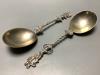 A pair of late Victorian silver apostle serving spoons by H Samuel Ltd, London, 1895, length 18.9 cm, 130 g.                                                                                                                