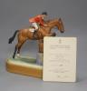 Doris Lindner for Royal Worcester, a limited edition figure, 'Foxhunter and Lt. Col. H M Llewellyn C.B.E.', no. 262/500, circa 1960, on wooden plinth, with certificate                                                     