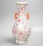 A Chinese famille rose millefleur 2 handled vase, 36cms high.                                                                                                                                                               