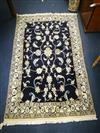 A Nain dark blue ground rug 190 x 115cm                                                                                                