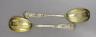 An ornate pair of Victorian silver gilt serving spoons, Lias & Lias, London,1874, 20.6cm, 6.4oz.                                                                                                                            