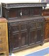 A 17th century style oak court cupboard W.125cm                                                                                        