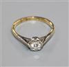 An 18ct gold and illusion set solitaire diamond ring, size M.                                                                          