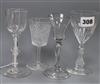 An 18th century wine glass with bucket-shaped bowl on knopped and multi-cottontwist stem and three other wine glasses H.15cm           