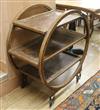 A 1930's oak tea trolley. W.75cm                                                                                                       