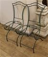 A pair of French metal folding chairs                                                                                                  