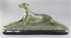 A. Frot. A bronze model of a greyhound lying upon naturalistic base, width 23.5in. height 10.5in.                                      