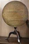 A george III oak tripod table. W.71cm                                                                                                  