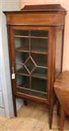 An Edwardian banded mahogany glazed bookcase W.61cm                                                                                    