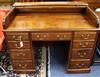 An early 20th century George III style mahogany roll top desk W.122cm                                                                  